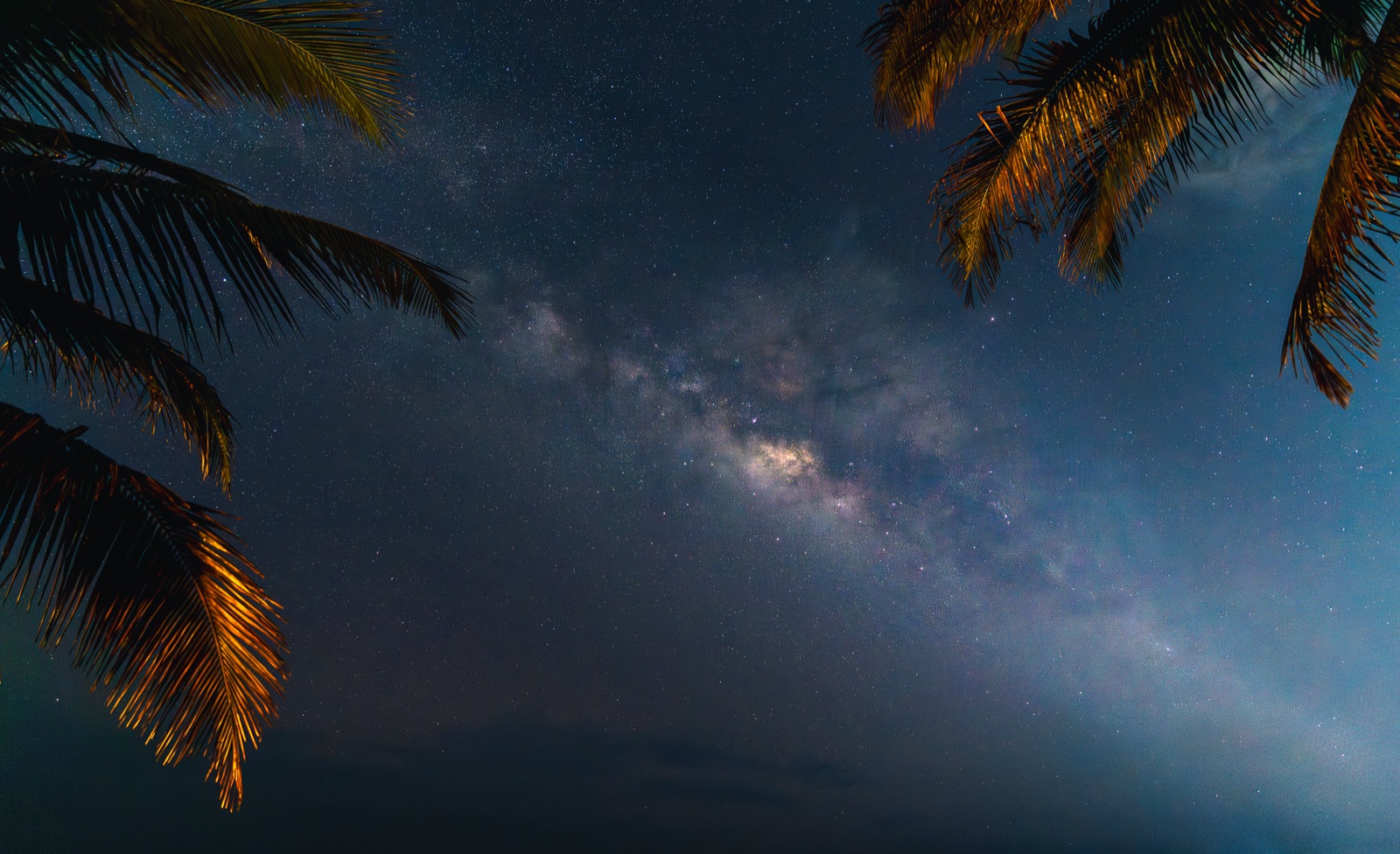 The Milky Way over a dark horizon