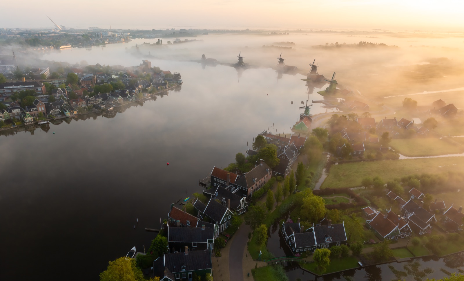 A misty dawn over a river valley